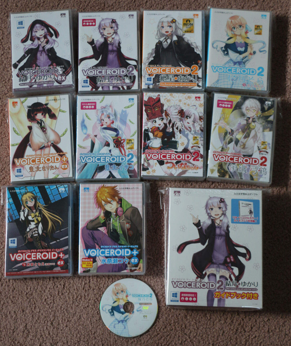 a picture of several physical voice roids as well as a extra disc for haruno sora..
